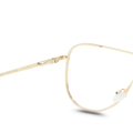 Gold-framed eyeglasses on a white background