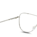 Silver eyeglasses on a white background